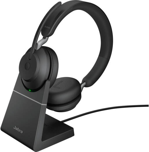 Jabra Evolve2 65 UC Stereo Wireless Headset with Link 380a and charging stand, featuring advanced noise isolation, 40 mm speakers, three-microphone call technology, plush memory-foam ear cushions, and a sleek black finish.