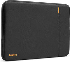 A black Tomtoc Defender-A13 laptop sleeve for 13-inch MacBook or Surface Laptop, providing 360° protection with patented CornerArmor, crafted from durable recycled fabric, and finished with YKK zippers.