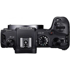 Canon EOS RP compact mirrorless camera with mount adapter included.