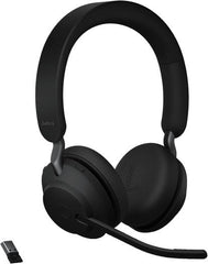 Jabra Evolve2 65 UC Stereo Wireless Headset with Link 380a and charging stand, featuring advanced noise isolation, 40 mm speakers, three-microphone call technology, plush memory-foam ear cushions, and a sleek black finish.