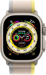 Apple Watch Ultra with GPS + Cellular, 49mm titanium case, yellow/beige Trail Loop (S/M), customizable Action Button, and up to 36 hours of battery life