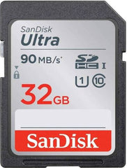 Kodak PIXPRO FZ55 digital camera in blue, bundled with a SanDisk 32GB Ultra SD card and card reader, featuring a 16.35MP sensor, 5× optical zoom, 28mm wide-angle lens, 2.7-inch LCD, and Full HD 1080p video recording.