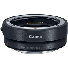 Canon EOS RP compact mirrorless camera with mount adapter included.